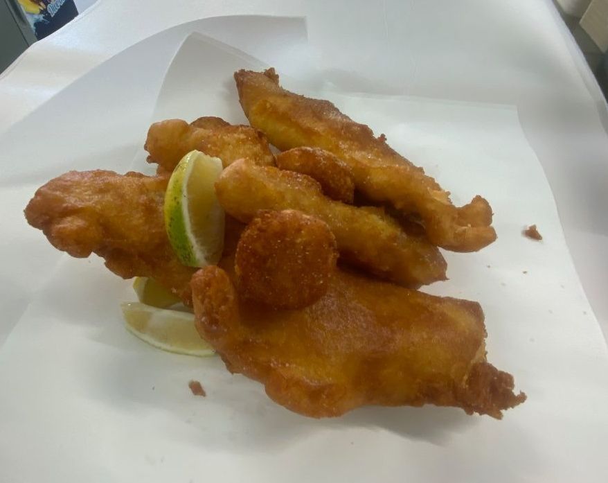 A Piece of Battered Fish On Takeaway Paper  — Parkside Snack Shack in Emu Park