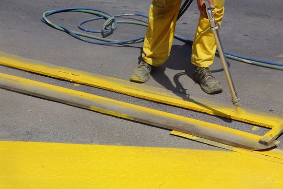 spray painting yellow lines
