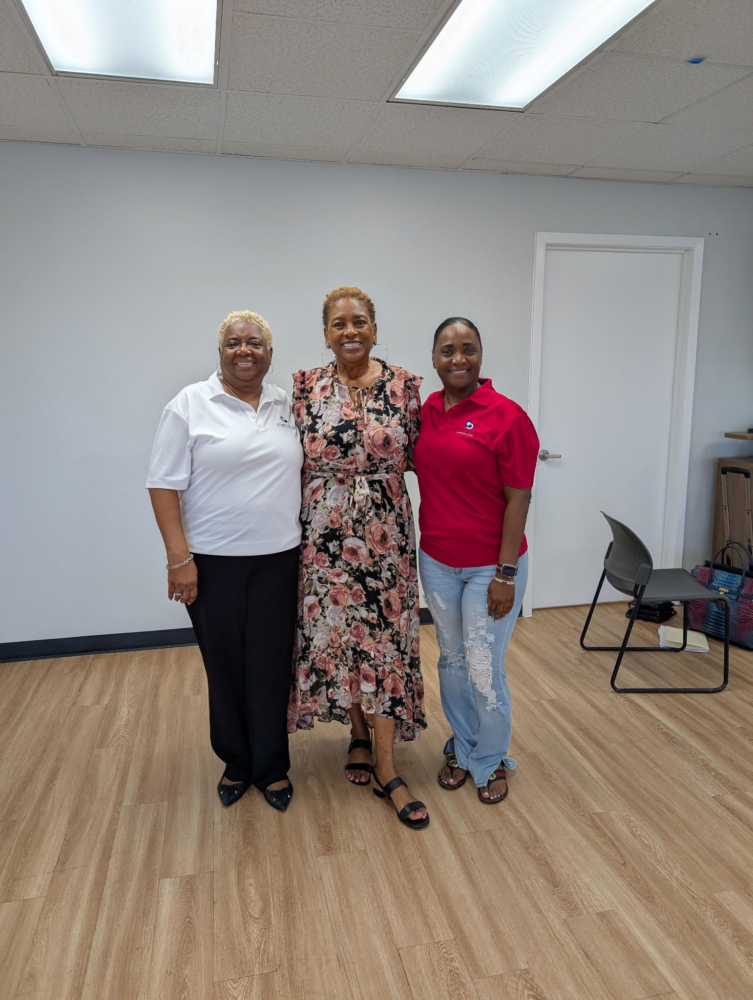 A woman wearing a blue shirt with the word canada on it