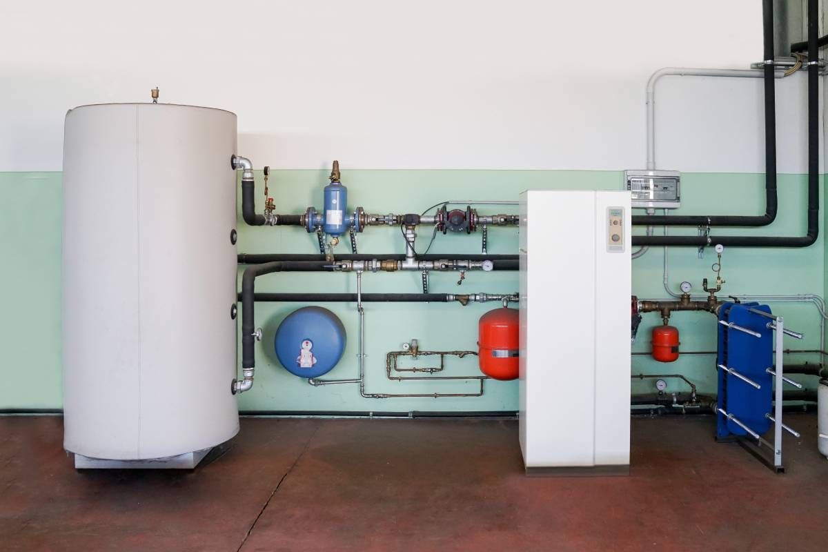 Geothermal heat pump, part of a geothermal energy heating and cooling system, in a commercial space at Advantage Air HVAC near Lexington, KY