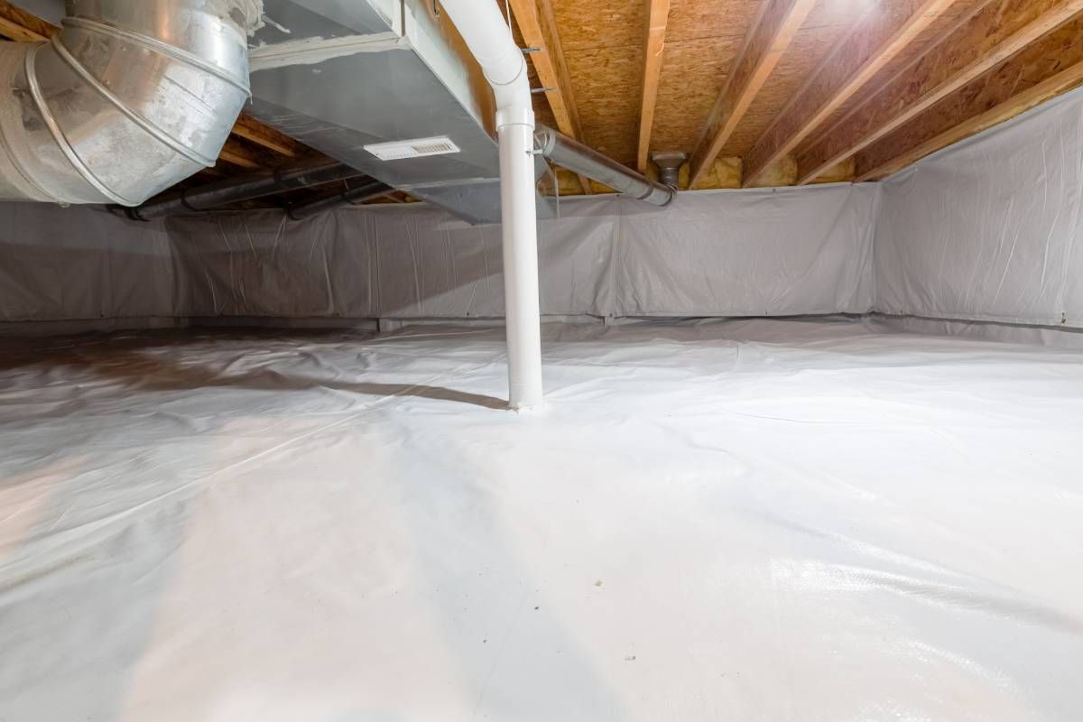 A new build home's spacious crawl space with visible pipes, duct work, and vents at Advantage Air HVAC near Lexington, Kentucky