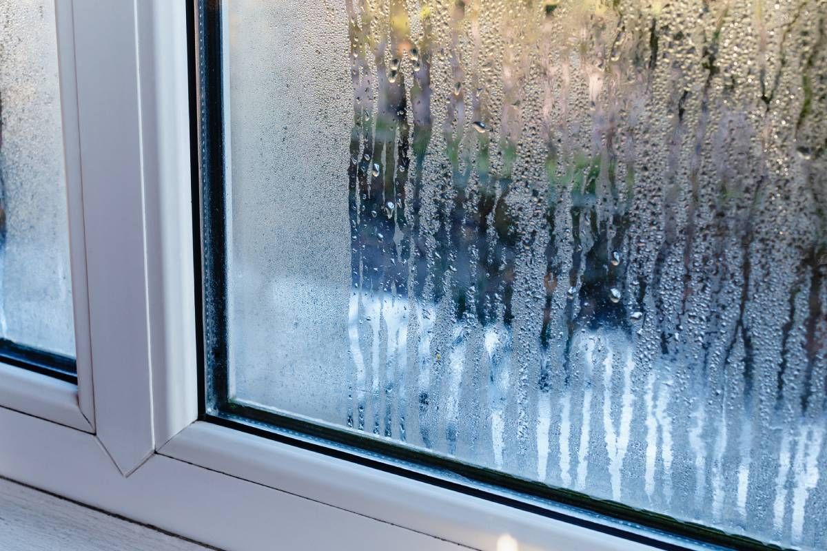 Condensation gathering on a window because of overly humid air near Lexington, Kentucky (KY)