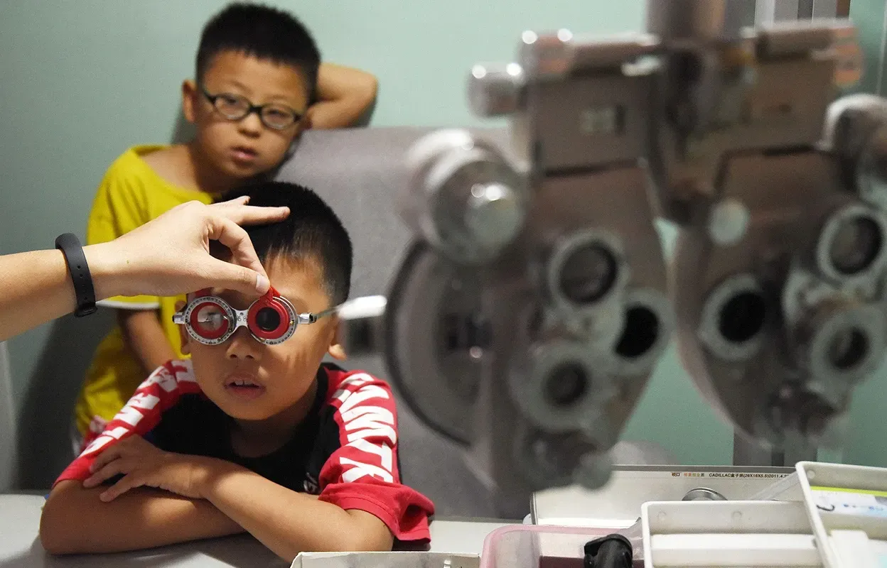 Kids getting an eye exam