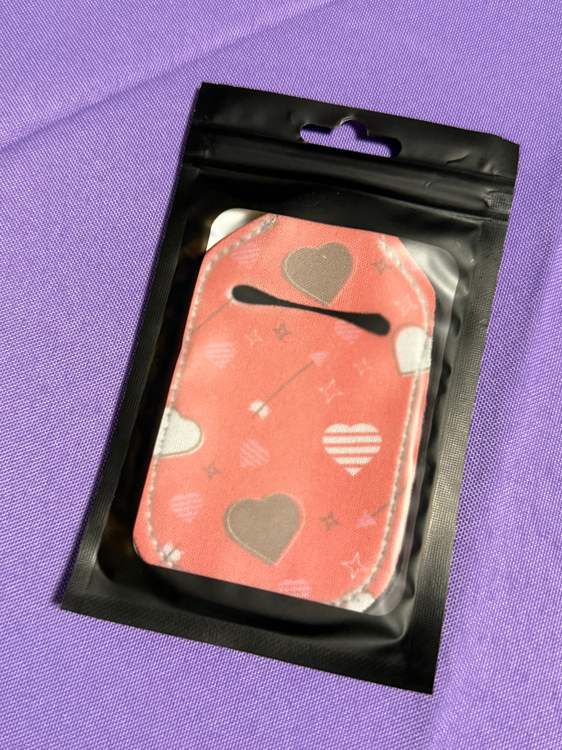 Red with brown and white heart, hand sanitizer keychain with a bottle of sanitizer $6.99