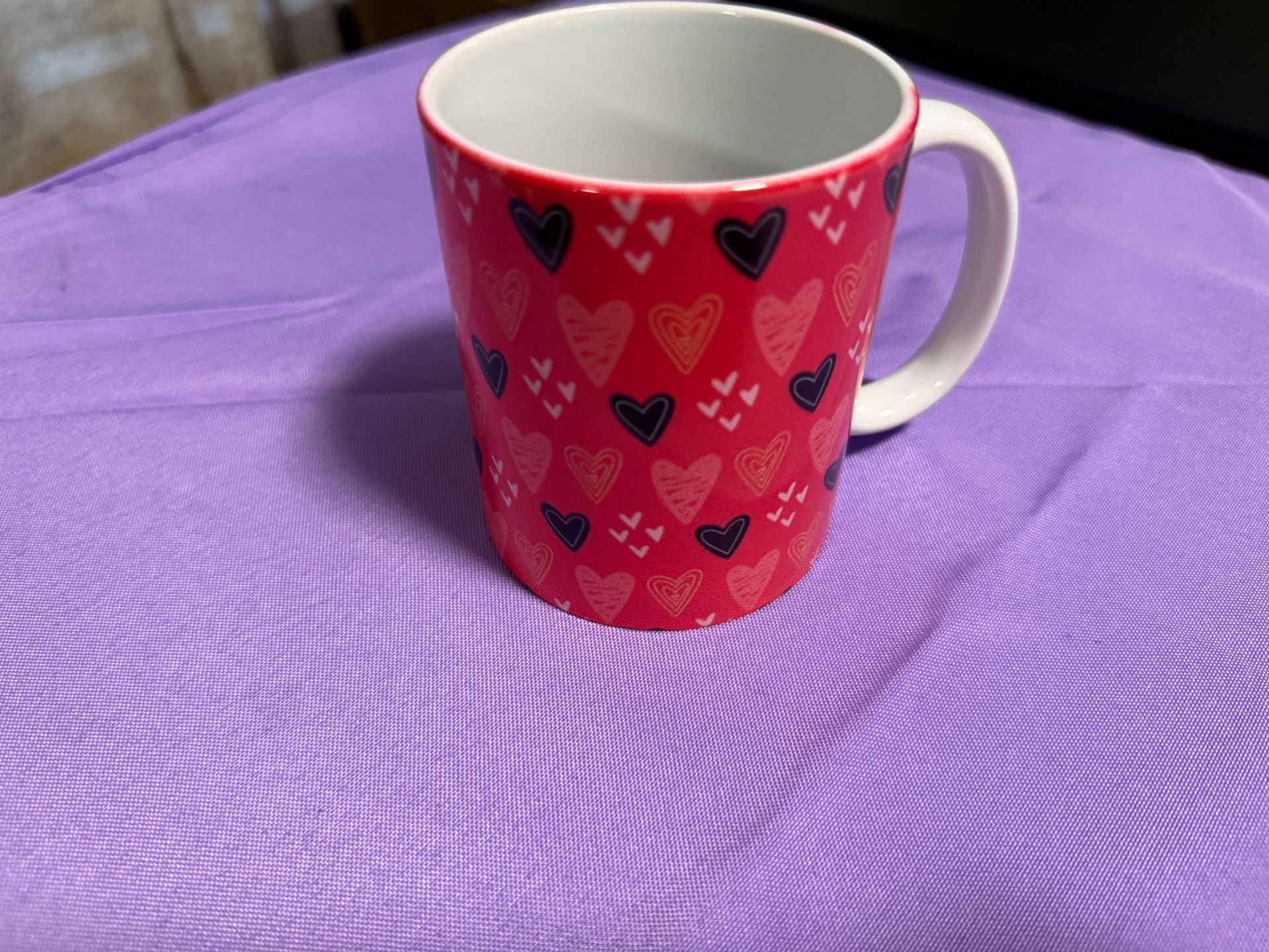 Red wrapped around black and white hearts