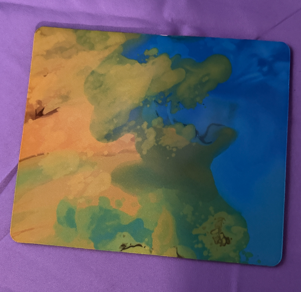 large blue, green and yellow mouse pad