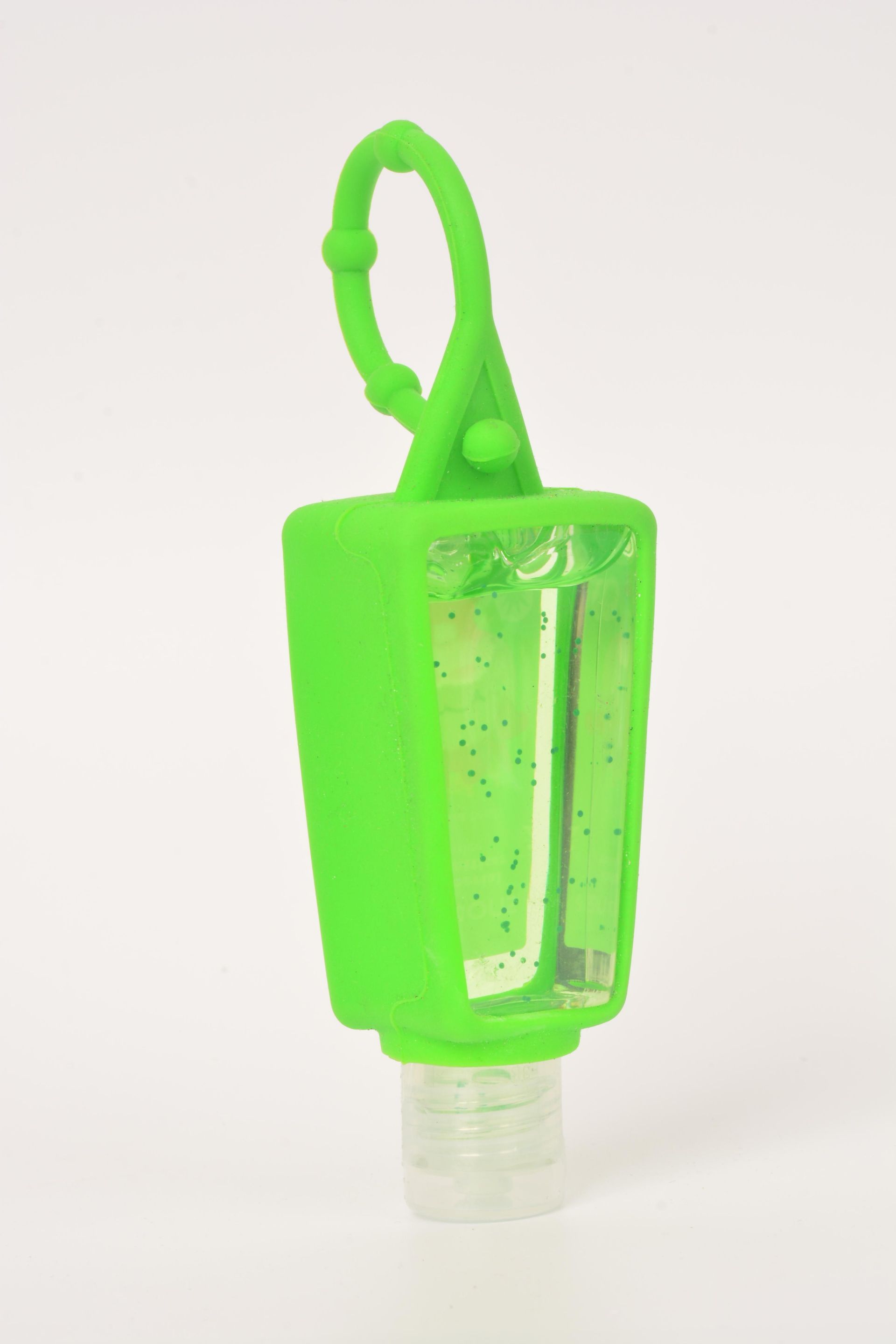 Green hand sanitizer bottle with glitter, in a silicone holder with a loop.