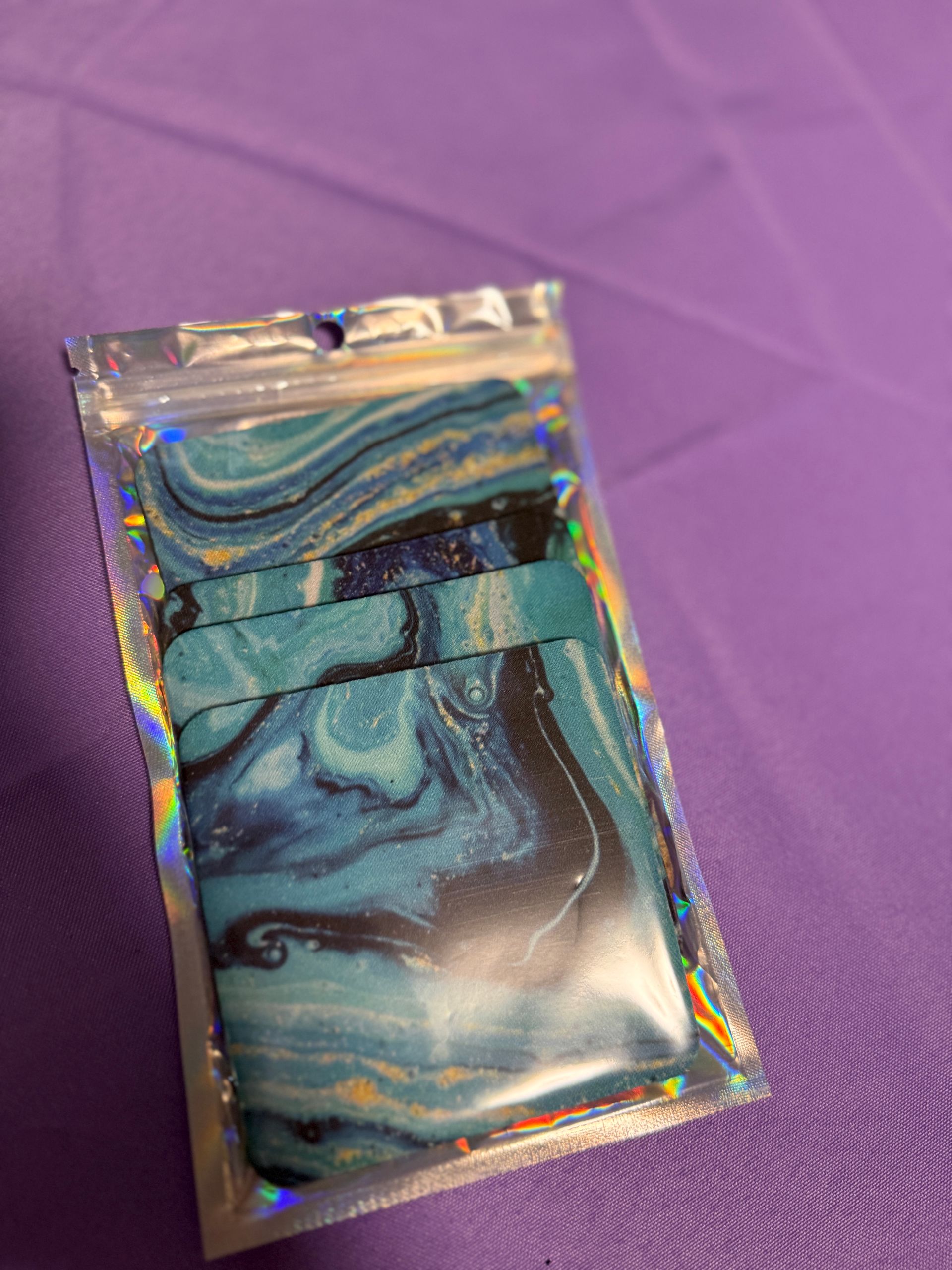 watercolor, blue, black, and a touch of orange cup coasters