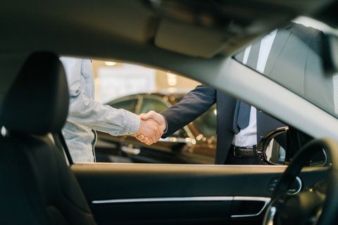 Car Sales Person And Customer — Ellendale, MN — Misgen Auto Parts