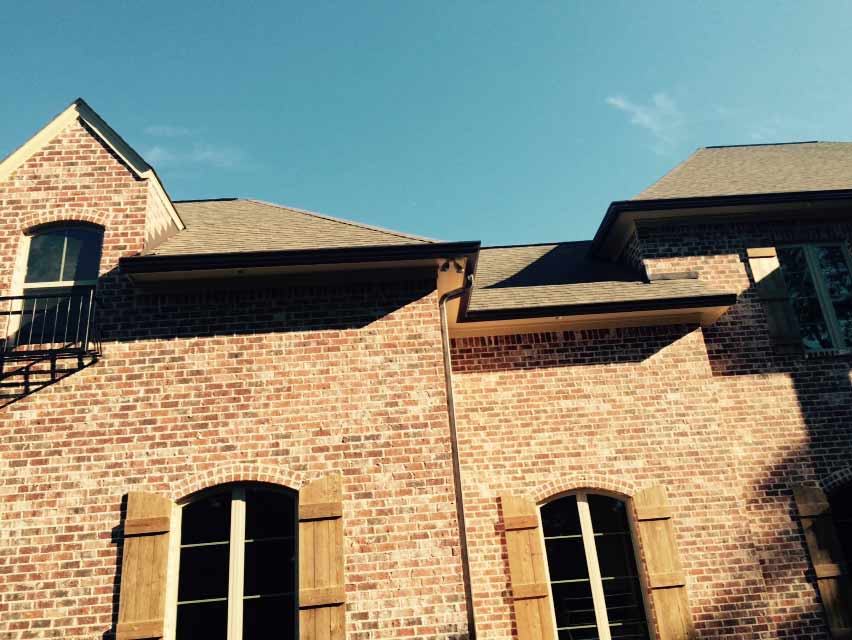 Gutter Caps — Brick House With Two Windows in Madison, MS