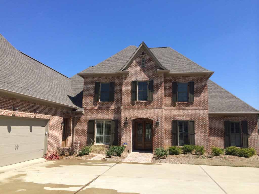 Rain Gutter Installation — Brick House Far View in Madison, MS