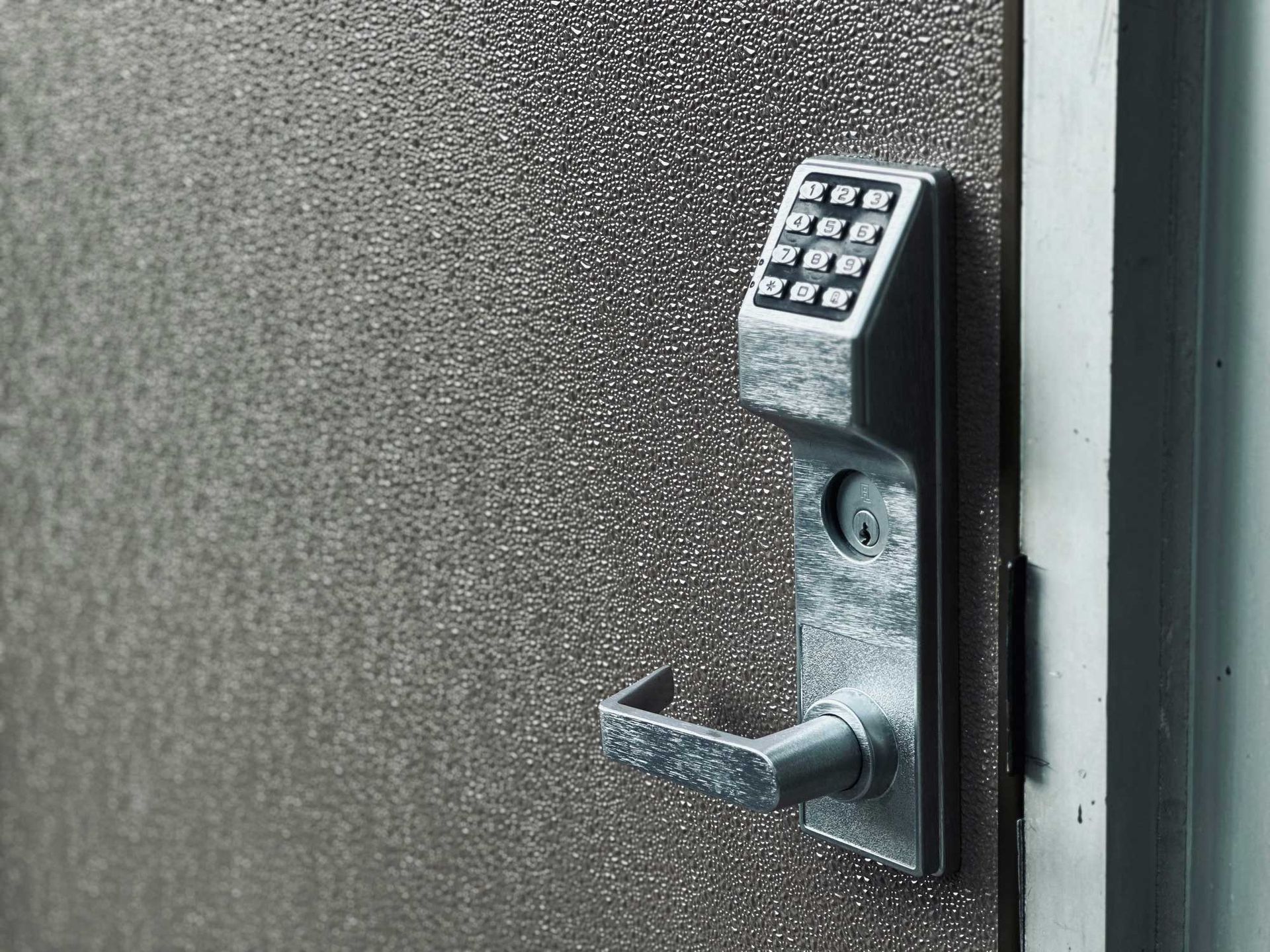 A close up of a door with a high security lock.