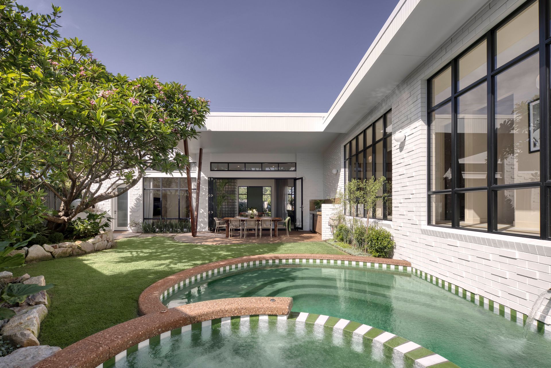 Large Swimming Pool in the Backyard of a House — Beith Building & Developments Pty Ltd In Burleigh Heads, QLD