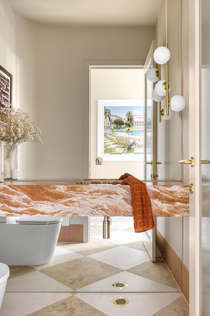 Bathroom With a Sink , Toilet , and Mirror — Beith Building & Developments Pty Ltd In Burleigh Heads, QLD