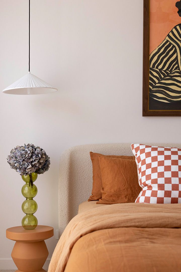 Bedroom With a Bed , Nightstand , Lamp and Painting on the Wall — Beith Building & Developments Pty Ltd In Burleigh Heads, QLD