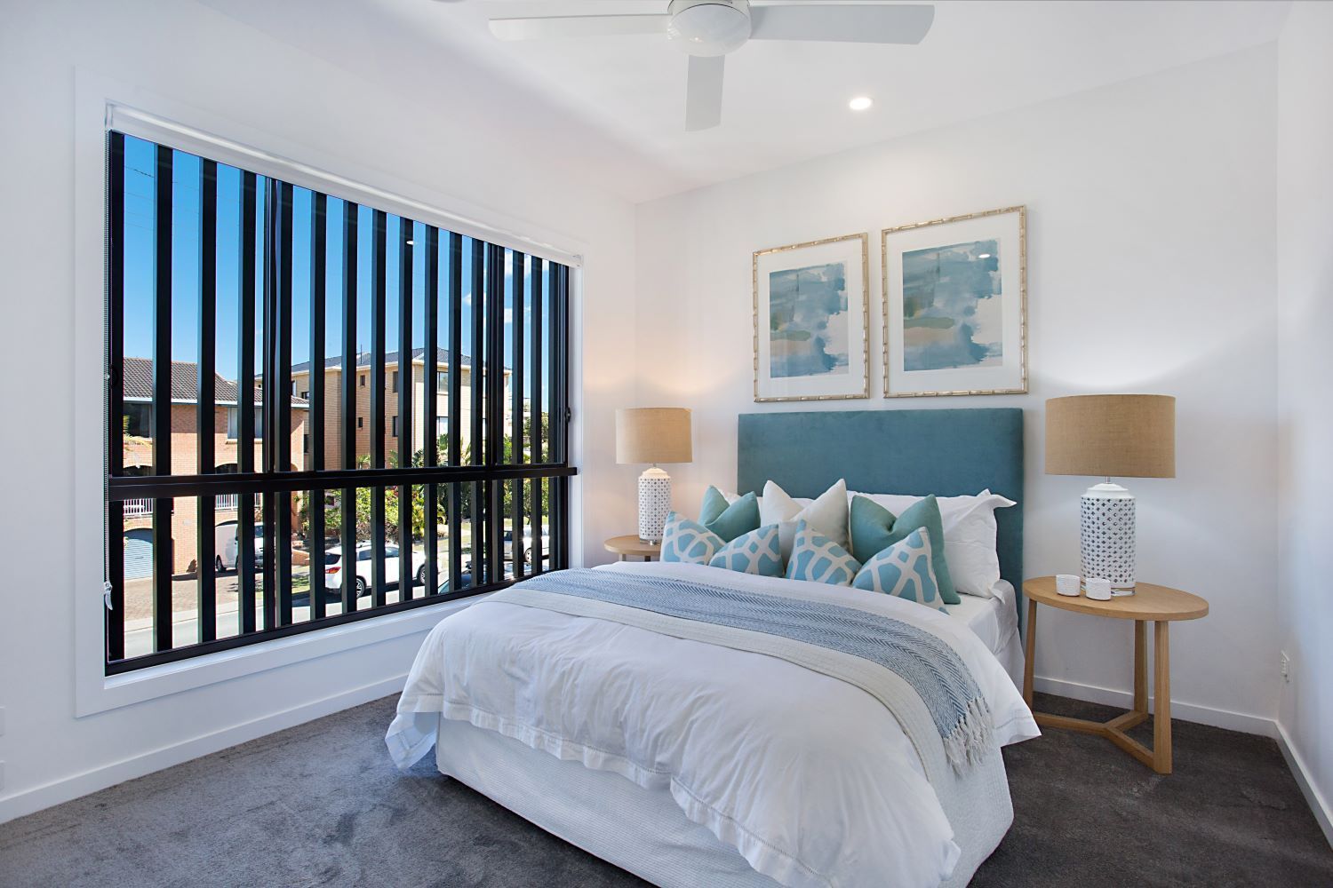 A Bathroom With a Bathtub , Sink , Shower and Mirror — Beith Building & Developments Pty Ltd In Burleigh Heads, QLD
