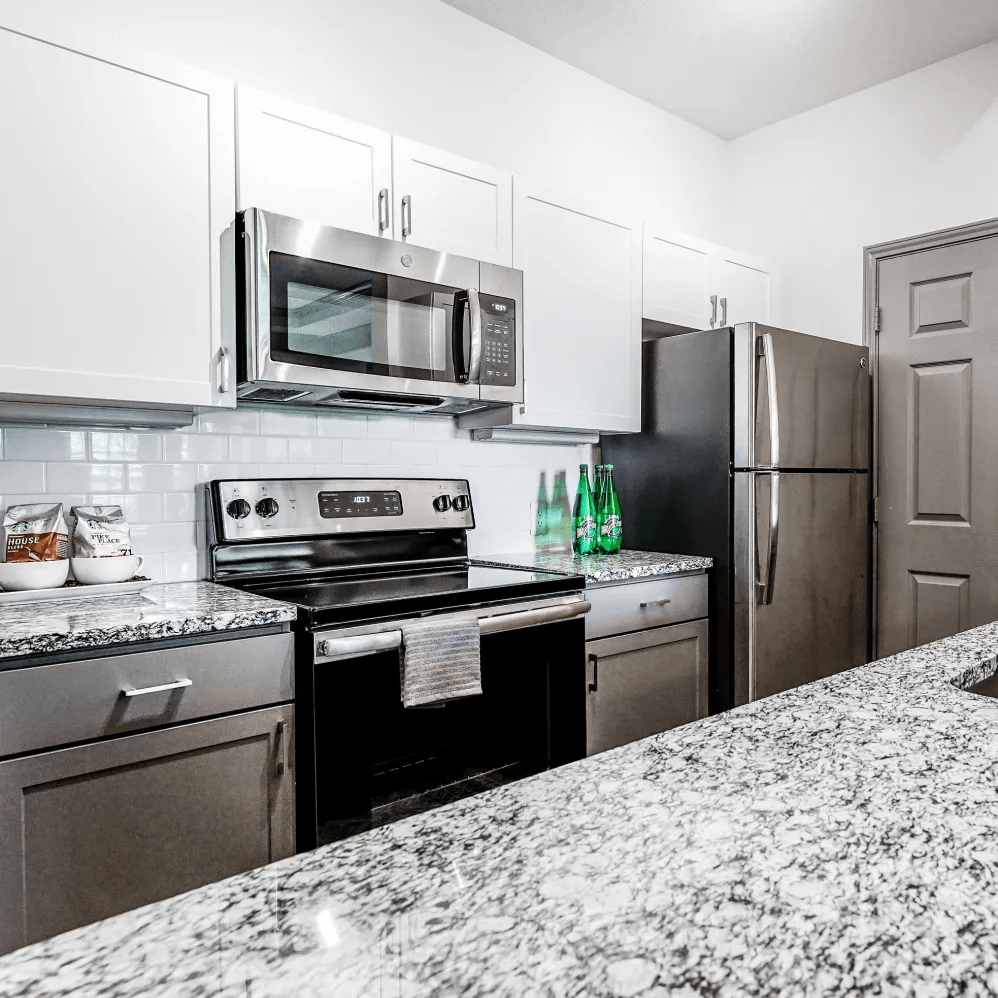Kitchen with stainless steel appliances |  Beck at Wells Branch