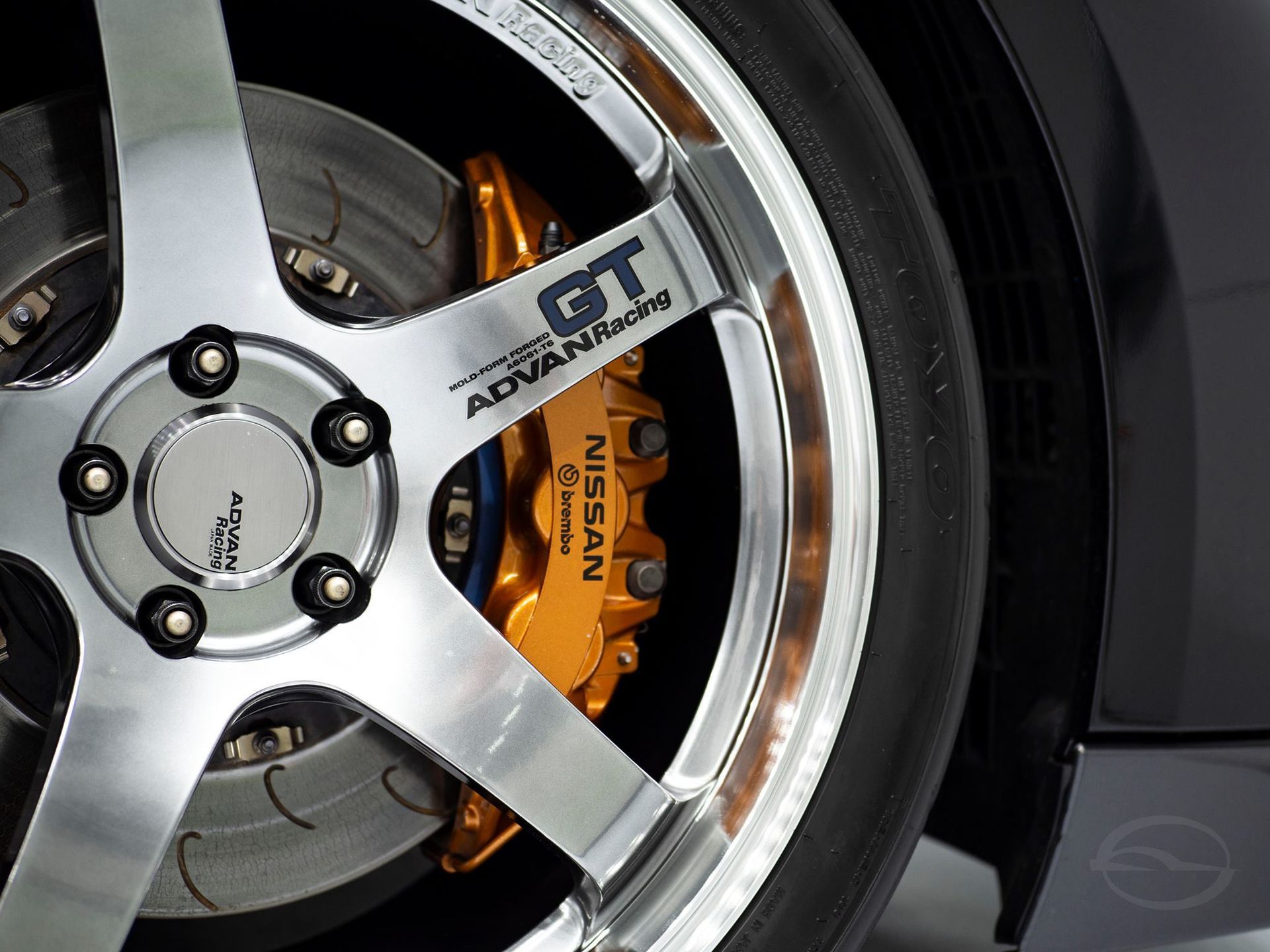 A close up of a nissan gt wheel