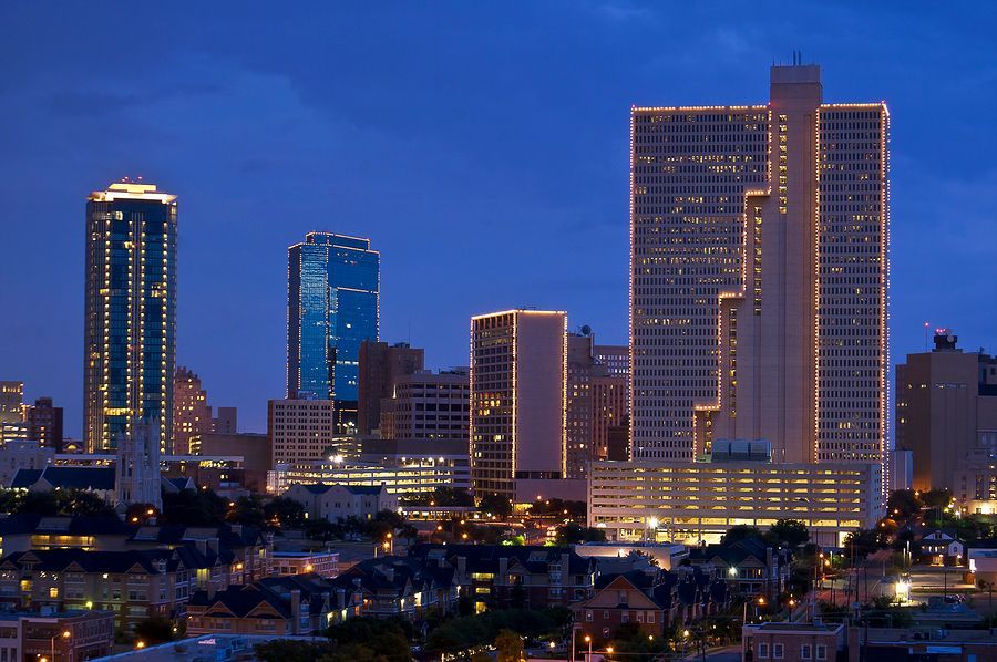 Image provided by RattikinLaw. Photos shows the Fort Worth skyline at night. No text.