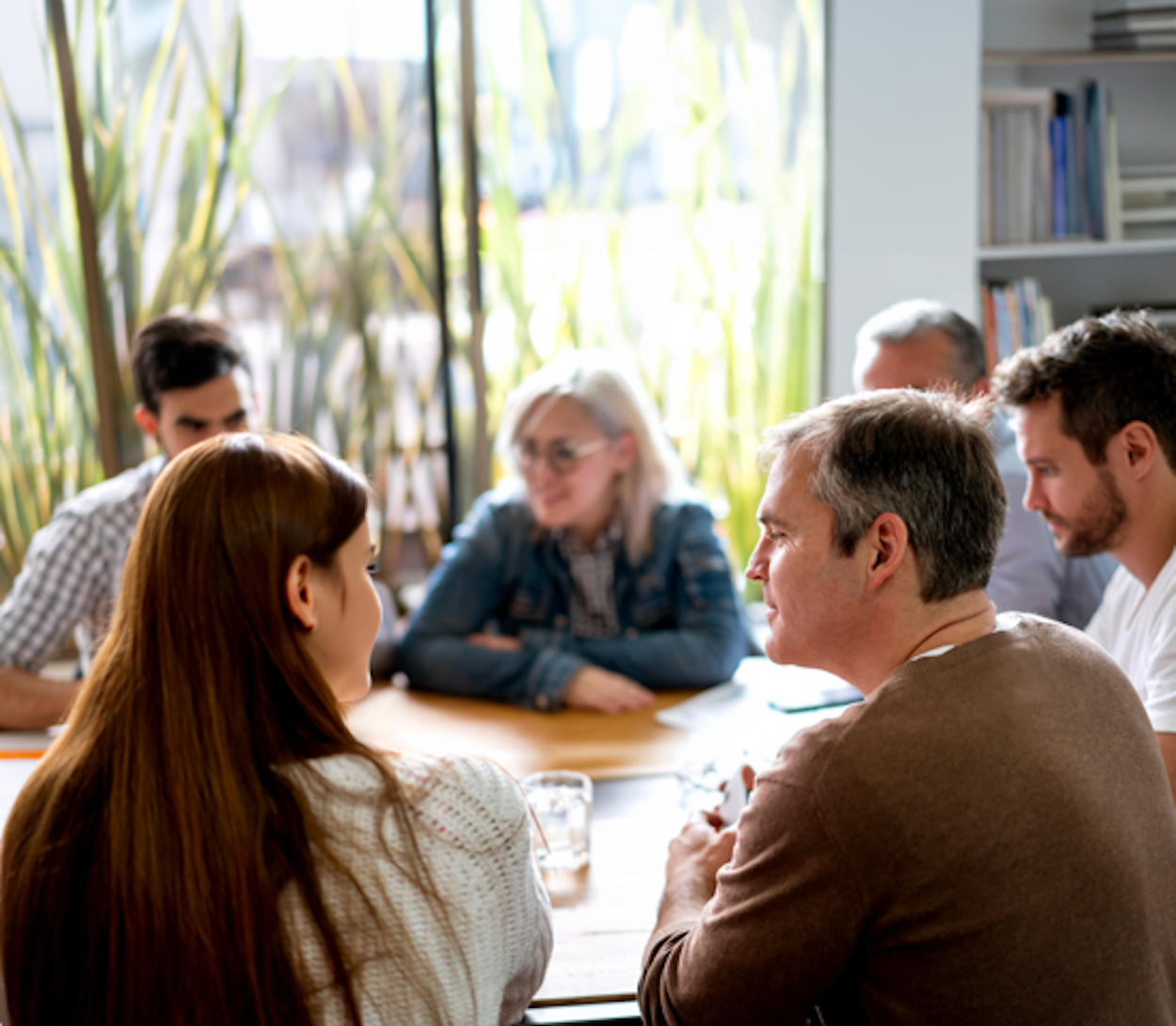 Family sitting at the dining table to discuss estate planning
