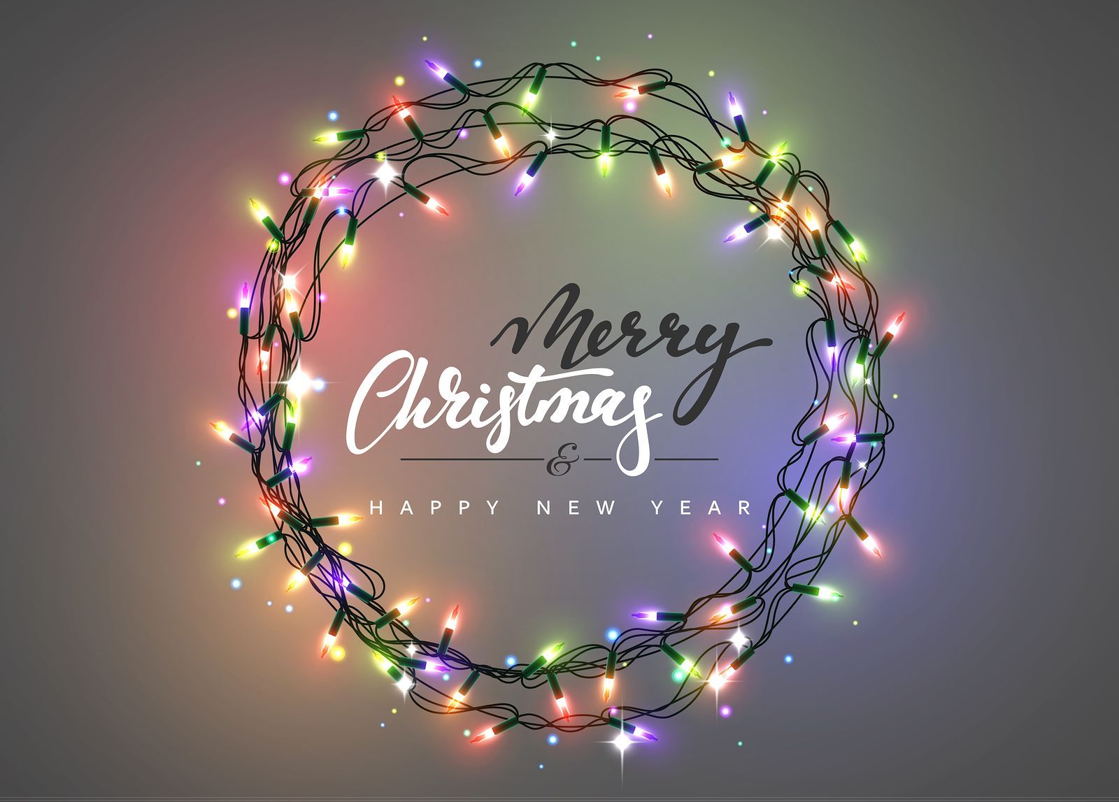 Graphic shows a wreath of Christmas lights with text that says, 'Merry Christmas, Happy New Year.'