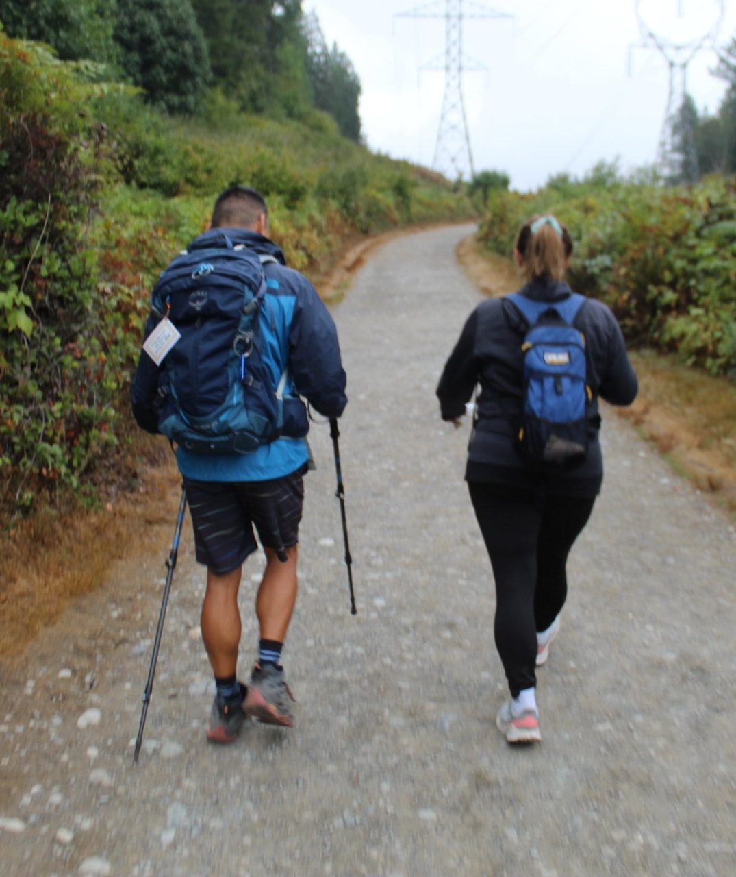 man and woman hiking