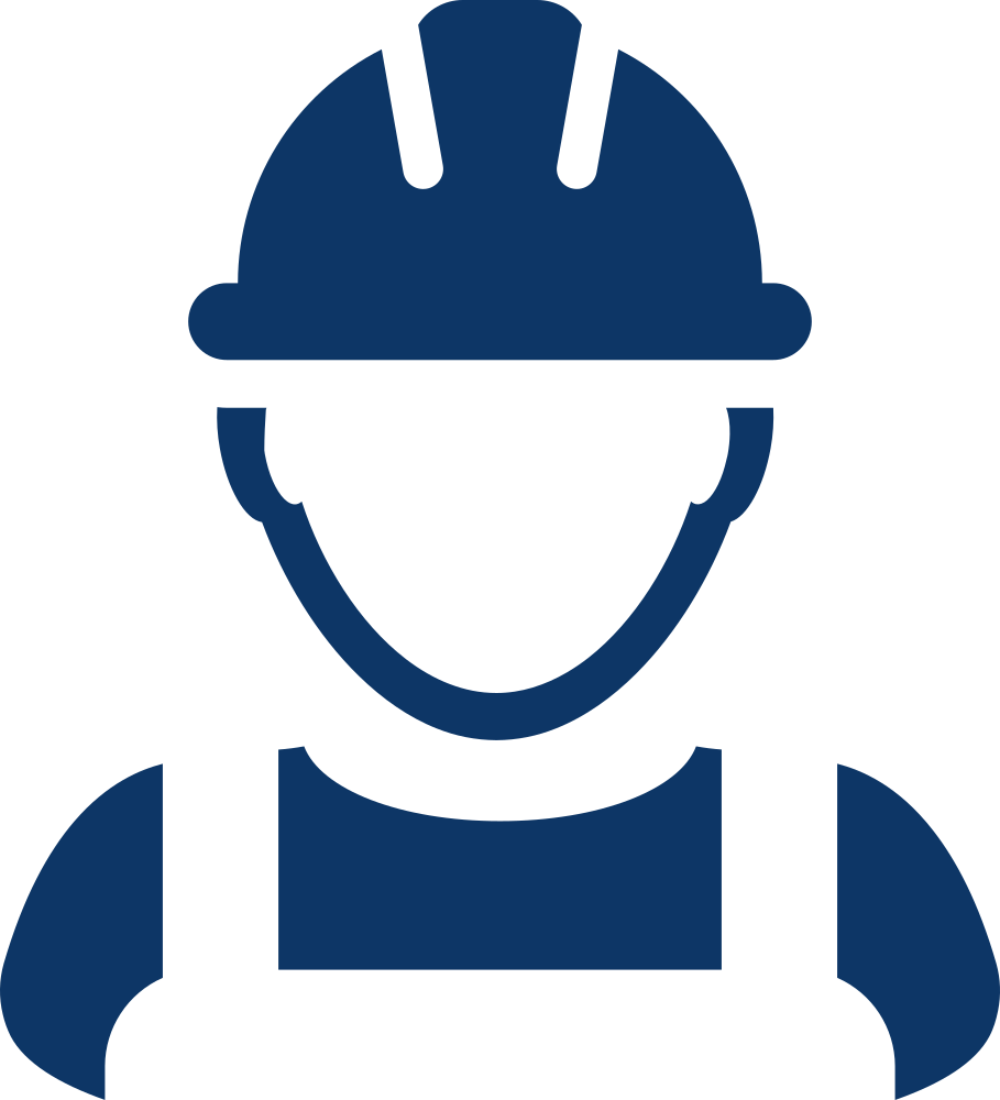 A construction worker wearing a hard hat and overalls.