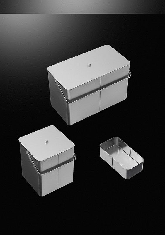 three plastic containers on a black background