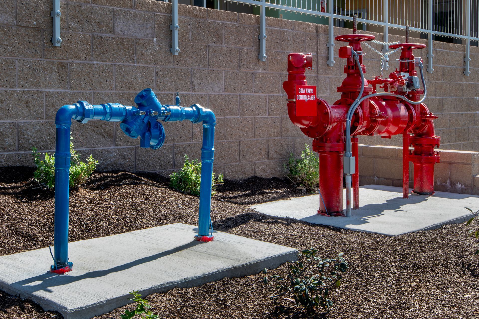Domestic water supply pipes with backflow preventers.