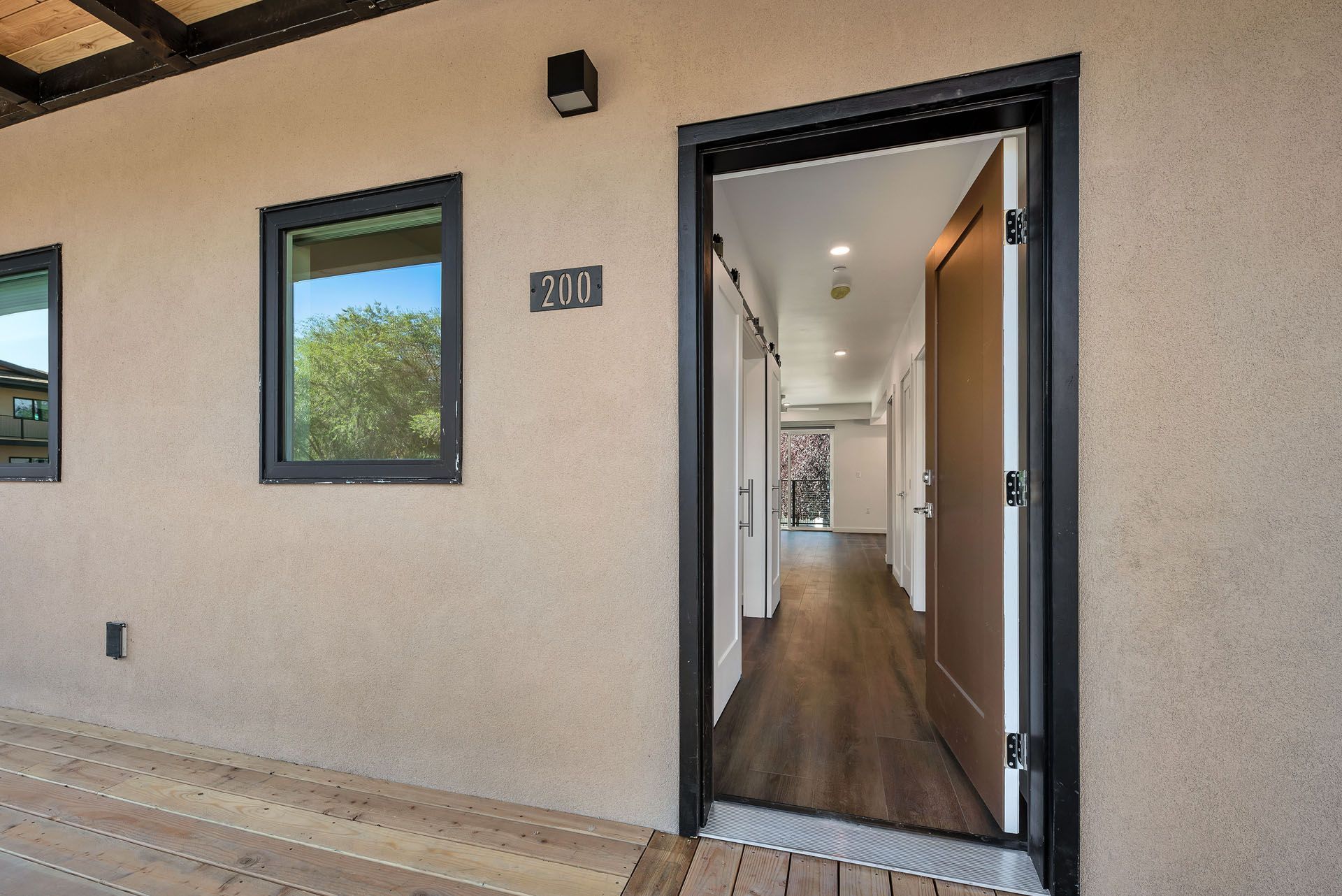 The front door of a house with the number 301 on it