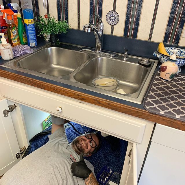 Plumber Repairing Kitchen Sink | Mount Juliet, TN | The Rooter Dude