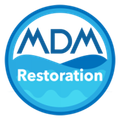 Blue circular logo for MDM Restoration. Contains white text and stylized waves.