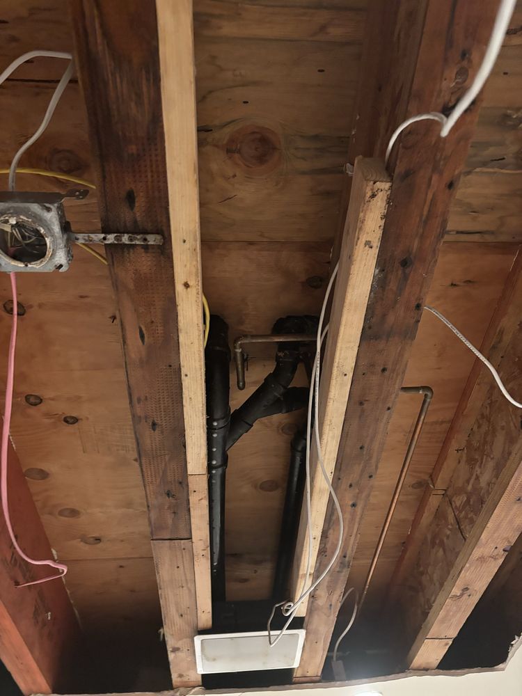 An aerial view of a large wave in the ocean.
