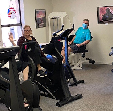 Physiotherapist Working with Client — Destin, FL — Quinn Physical Therapy PA Physiotherapist Working with Client — Destin, FL — Quinn Physical Therapy PA