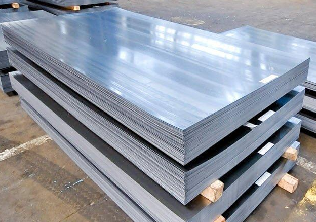 Metal square tubing stacked on shelves.