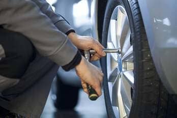 Changing tires - Vehicle maintenance in San Diego, CA