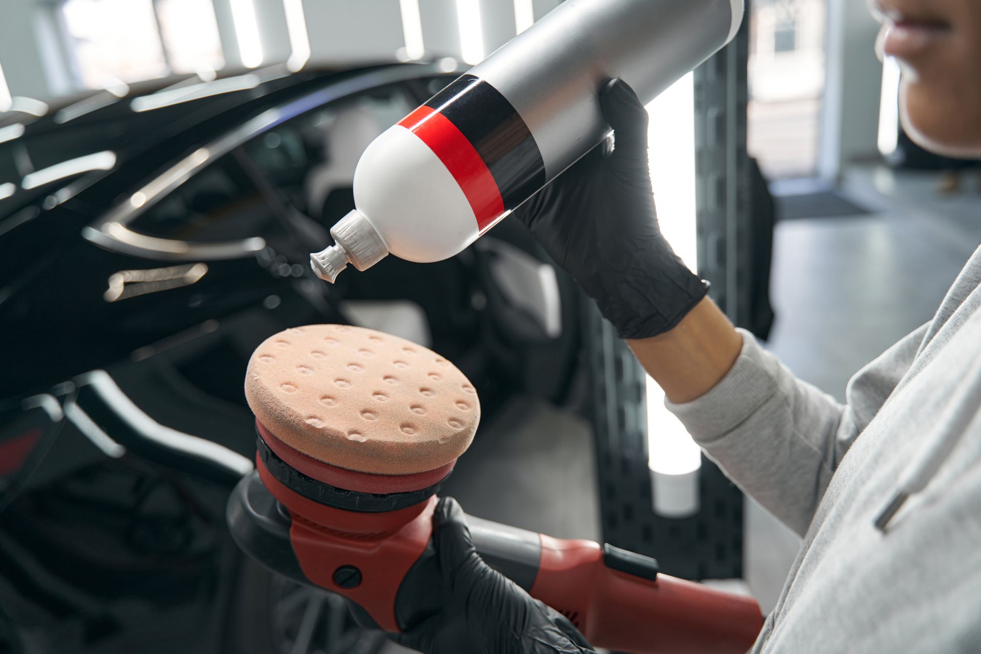 Paint Correction ā Worker using Paint Spray Gun in Lexington, KY