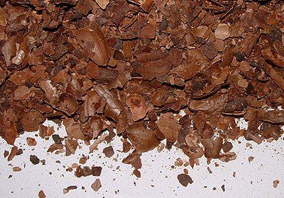 a pile of bulk shavings on a white surface