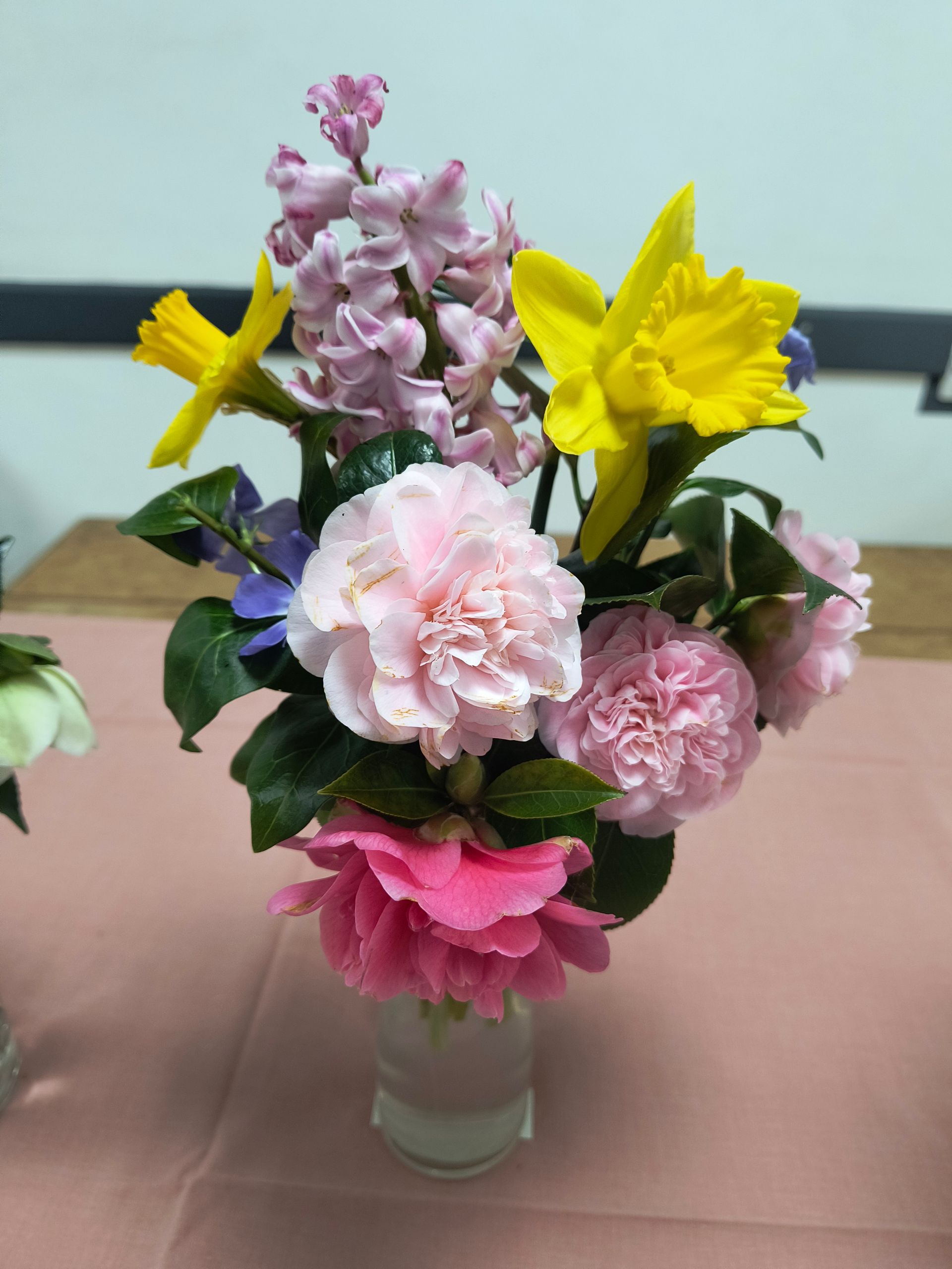 2nd prize Theresa D - an arrangement of pink camellia and purple vinca