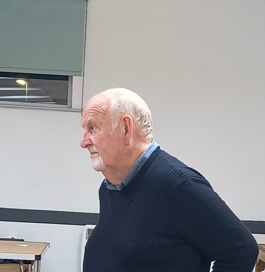 photo showing Barry Newman addressing members on a previous visit to the Club
