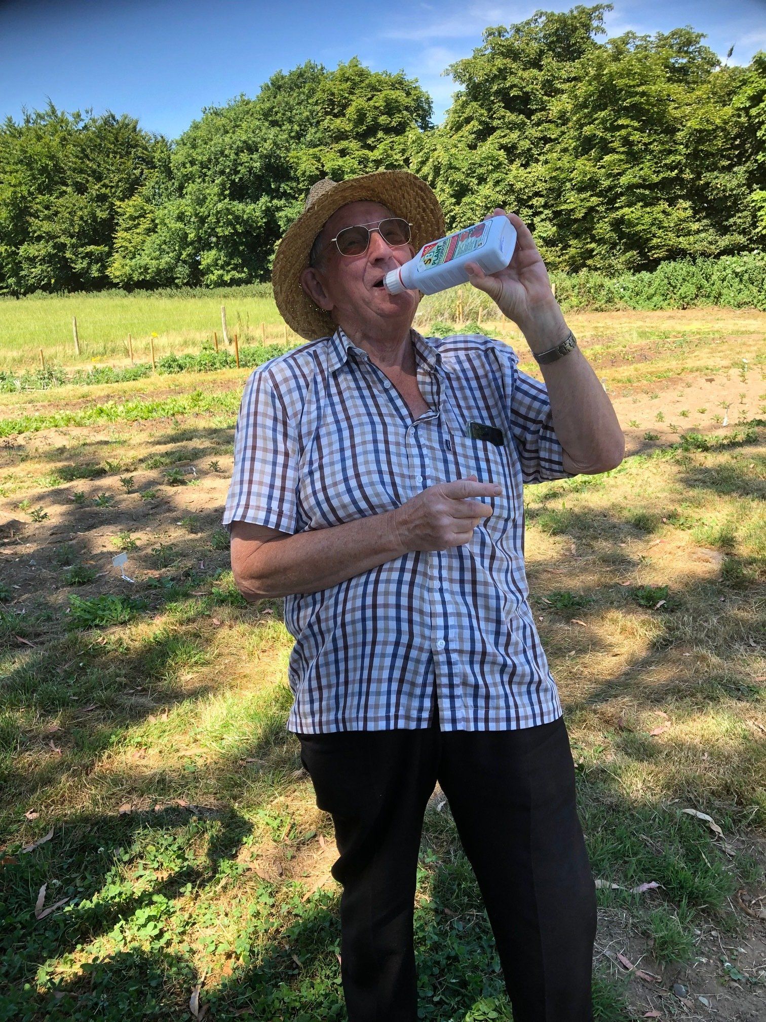Doug Glading pretending to drink SB Plant Invigorator
