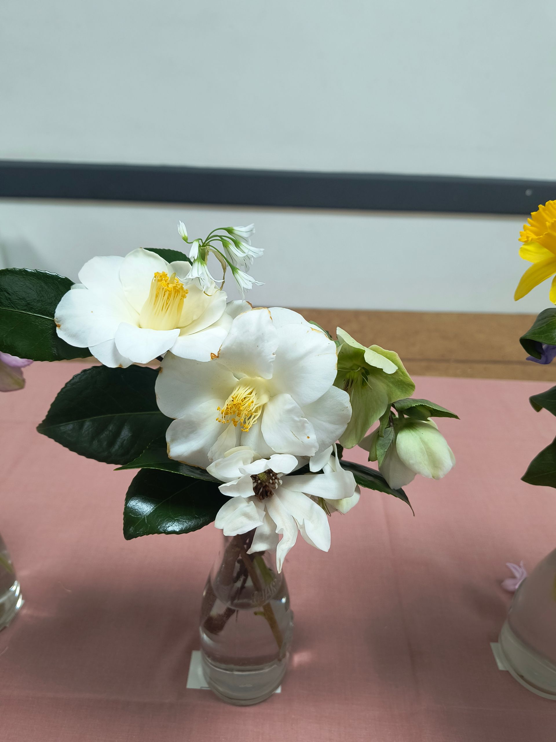 An arrangement of white and cream hellebores