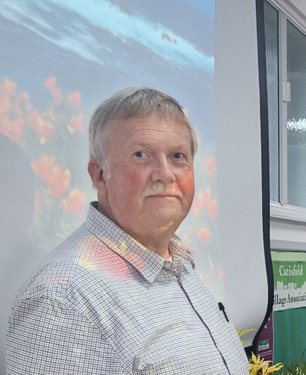 Martin Young standing in front of his first slide