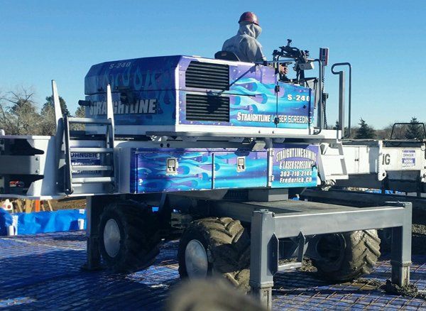 Concrete Contractors — S240 Somero Laser Screeds Working with Flat Floors  in Longmont, CO