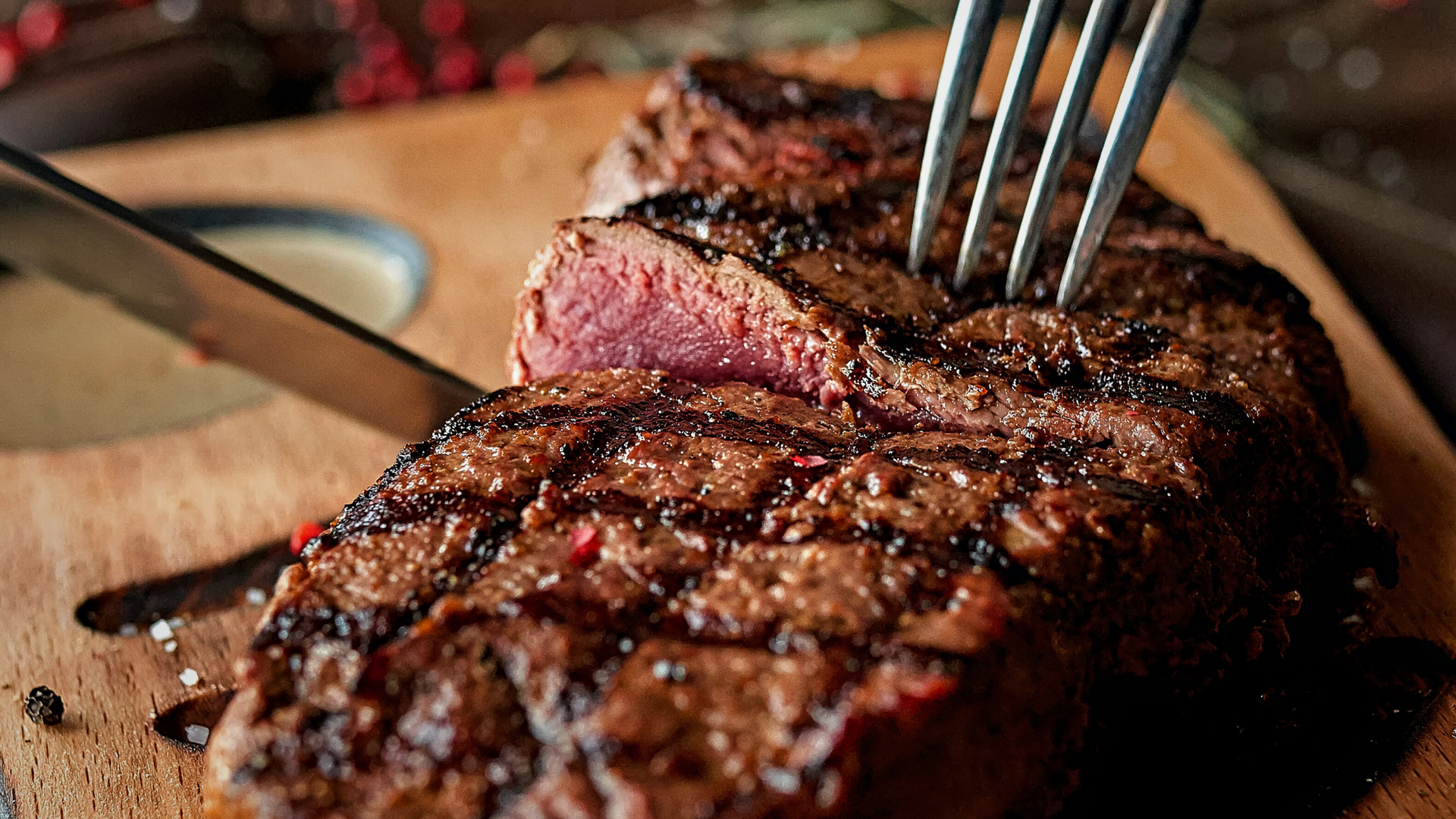 A close up of a piece of roast beef on a plate.