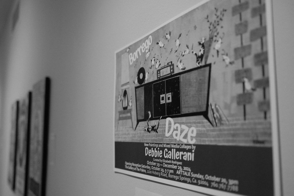 A black and white poster on a wall that says daze