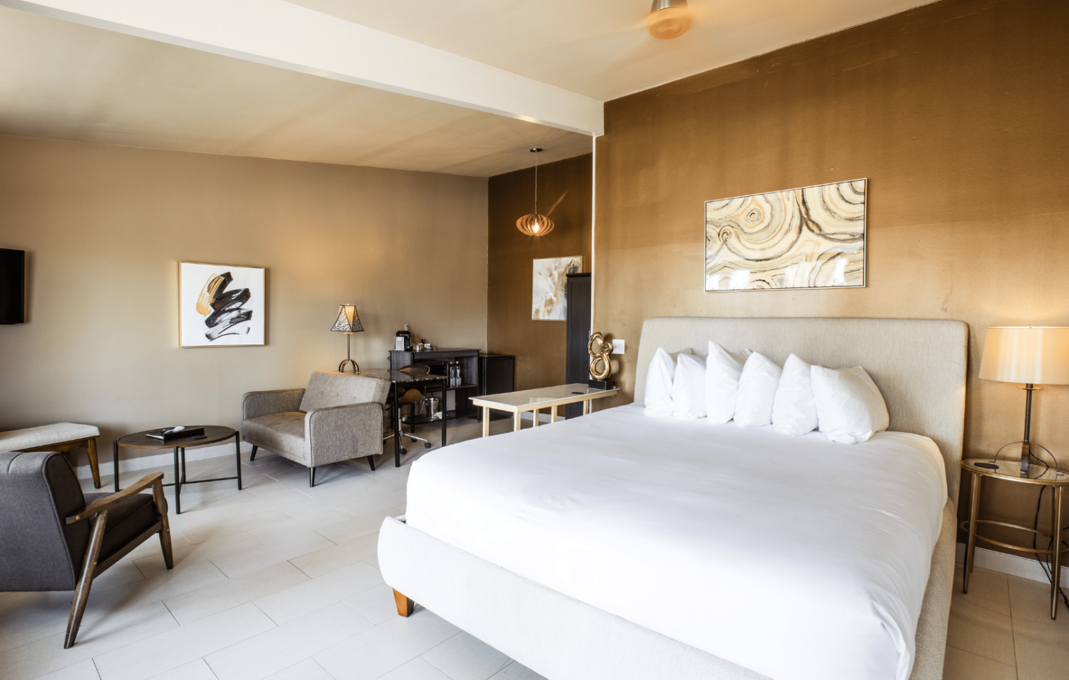 There is a large bed in the middle of the room.