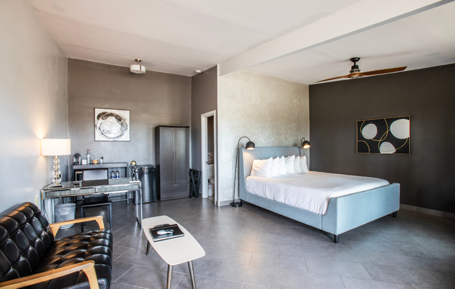 There is a large bed in the middle of the room.