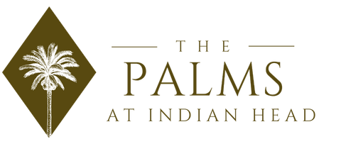 A logo for the palms at indian head with a palm tree in a diamond.
