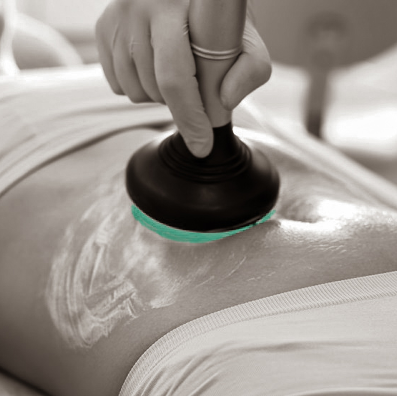 A black and white photo of a person getting a massage